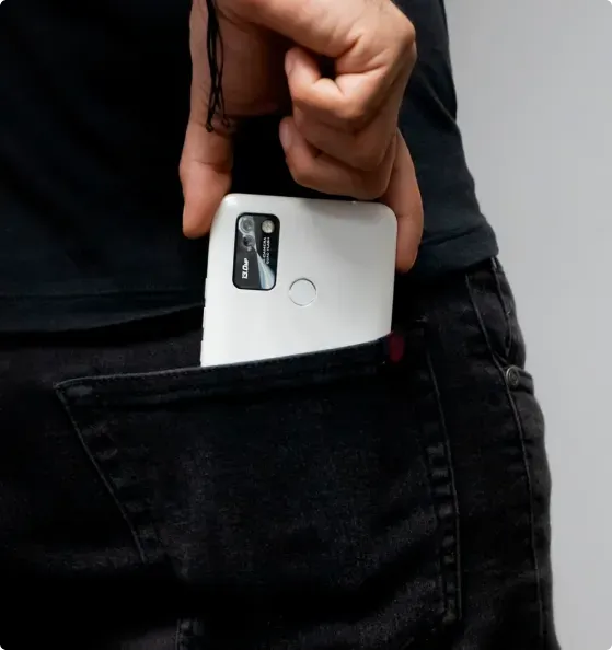 person with phone on his pocket
